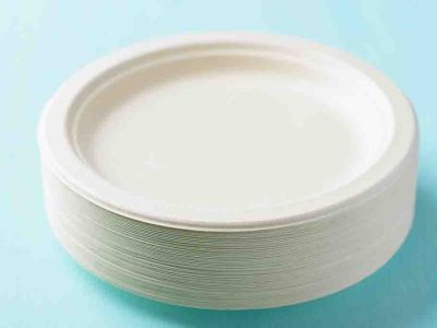 Stack of Biodegradable plate, Compostable plate or Eco friendly disposable plate on pastel colour background - Dev Foods, Melbourne - Specialised Food Packaging & Cleaning Products Distributor